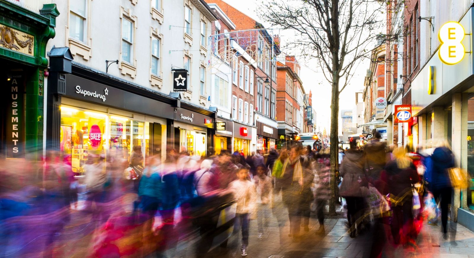 Shoppers queueing on a high street